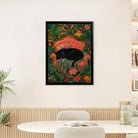 Framed Art Print of a Black Panther Resting on an Elegant Red Sofa Amidst Tropical Flowers and Greenery